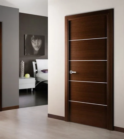 Wooden door with contemporary design and metal handle