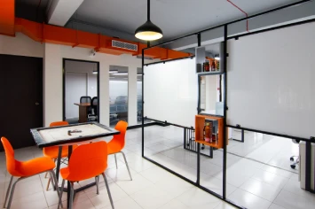 Employee lounge with modern seating – Neo office amenities