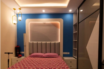 Spacious bedroom with ambient lighting – Zeeshan residence design